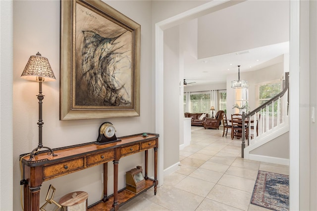 3042 Wentworth Way, Tarpon Springs, FL 34688 - hall with light tile patterned floors, stairway, and recessed lighting