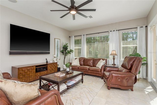 3042 Wentworth Way, Tarpon Springs, FL 34688 - living room with a ceiling fan and light tile patterned floors