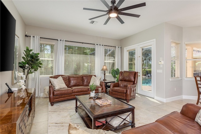 3042 Wentworth Way, Tarpon Springs, FL 34688 - living area with ceiling fan and light tile patterned floors