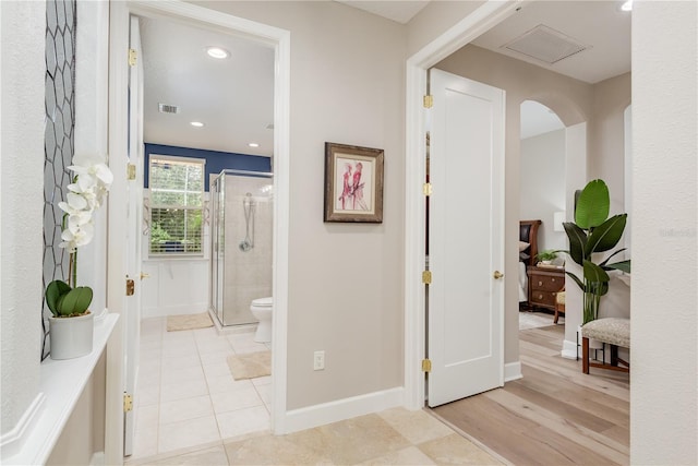 3042 Wentworth Way, Tarpon Springs, FL 34688 - corridor featuring light tile patterned floors, recessed lighting, and arched walkways