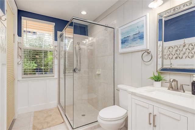 3042 Wentworth Way, Tarpon Springs, FL 34688 - bathroom featuring a decorative wall, a shower stall, vanity, tile patterned floors, and recessed lighting