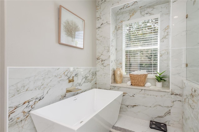 3042 Wentworth Way, Tarpon Springs, FL 34688 - full bath with plenty of natural light, a freestanding bath, and tile walls