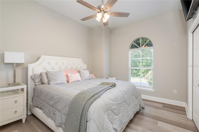 3042 Wentworth Way, Tarpon Springs, FL 34688 - bedroom featuring light wood-style flooring and a ceiling fan