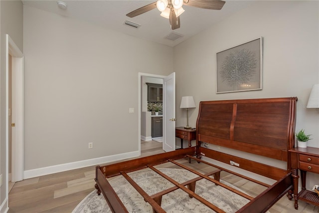 3042 Wentworth Way, Tarpon Springs, FL 34688 - bedroom featuring light wood-style flooring and a ceiling fan