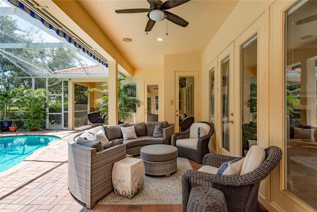 3042 Wentworth Way, Tarpon Springs, FL 34688 - sunroom / solarium with ceiling fan, outdoor lounge area, and a swimming pool