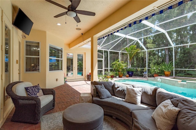3042 Wentworth Way, Tarpon Springs, FL 34688 - view of patio / terrace featuring french doors, outdoor lounge area, a ceiling fan, and a pool with connected hot tub