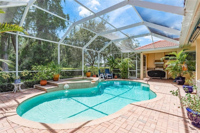 3042 Wentworth Way, Tarpon Springs, FL 34688 - view of pool featuring a patio area, a lanai, and a pool with connected hot tub