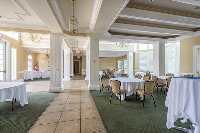 3042 Wentworth Way, Tarpon Springs, FL 34688 - carpeted dining room featuring ornate columns, ornamental molding, tile patterned floors, and a chandelier