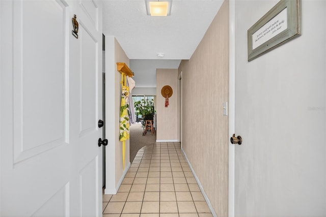 10351 Regal Dr Unit 24, Largo, FL 33774 - corridor featuring light tile patterned flooring and wallpapered walls