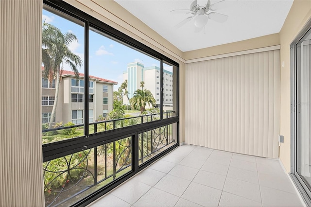 10351 Regal Dr Unit 24, Largo, FL 33774 - unfurnished sunroom with a ceiling fan