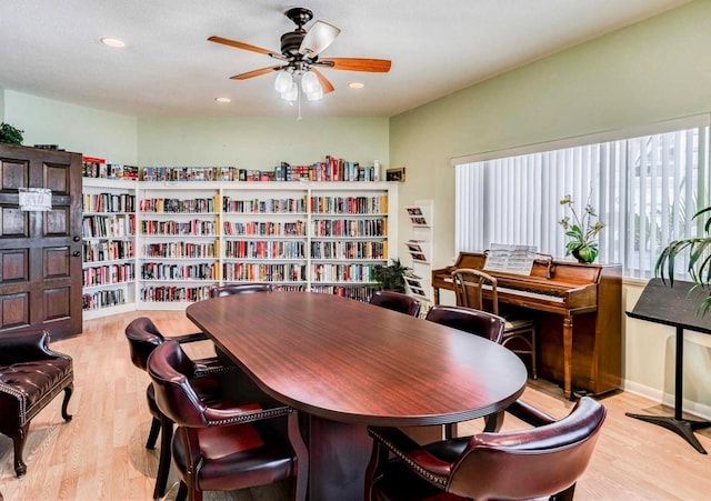 10351 Regal Dr Unit 24, Largo, FL 33774 - dining area with wood finished floors, a ceiling fan, and recessed lighting