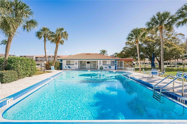 10351 Regal Dr Unit 24, Largo, FL 33774 - community pool featuring a patio