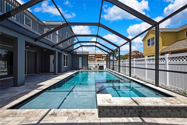 3241 Evening Breeze Loop, Wesley Chapel, FL 33544 - view of pool featuring an in-ground hot tub, a patio area, glass enclosure, and ceiling fan