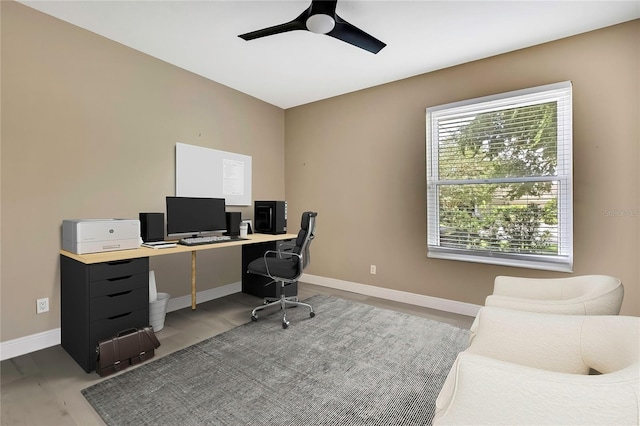 3241 Evening Breeze Loop, Wesley Chapel, FL 33544 - office area featuring a ceiling fan and light wood-style flooring