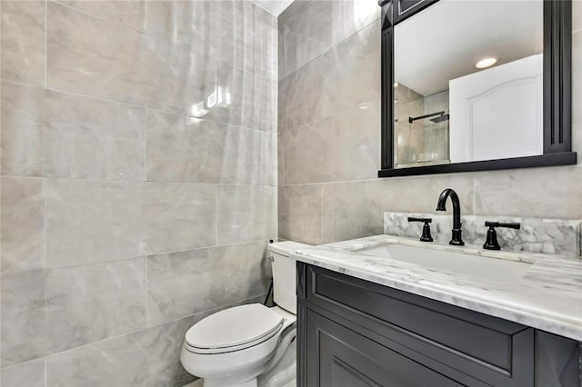3241 Evening Breeze Loop, Wesley Chapel, FL 33544 - bathroom with tile walls, vanity, and a tile shower