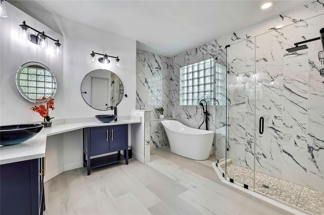 3241 Evening Breeze Loop, Wesley Chapel, FL 33544 - bathroom featuring a marble finish shower, a soaking tub, vanity, and recessed lighting