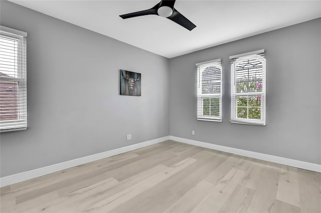 3241 Evening Breeze Loop, Wesley Chapel, FL 33544 - empty room featuring light wood-type flooring and a ceiling fan