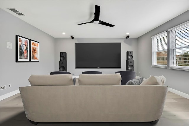 3241 Evening Breeze Loop, Wesley Chapel, FL 33544 - home theater room featuring a ceiling fan, recessed lighting, and light wood-style floors