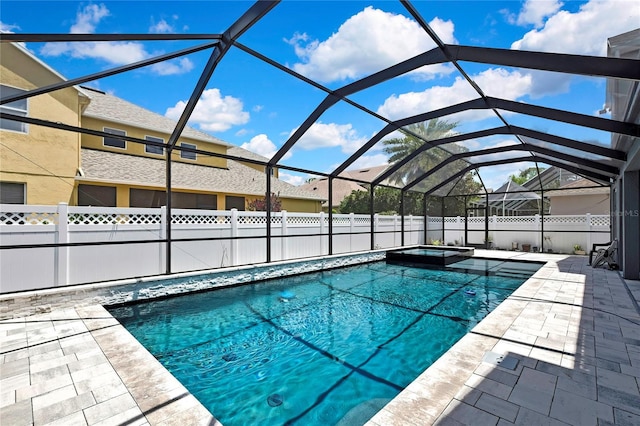 3241 Evening Breeze Loop, Wesley Chapel, FL 33544 - view of swimming pool with a pool with connected hot tub, a patio area, and a lanai