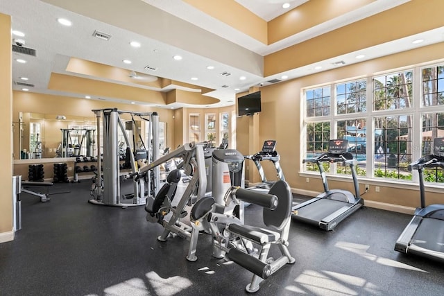 3241 Evening Breeze Loop, Wesley Chapel, FL 33544 - workout area with a tray ceiling and recessed lighting