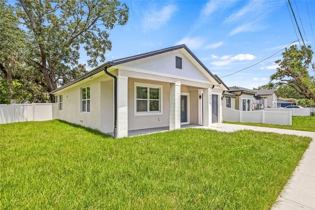 8319 N Ogontz Ave, Tampa, FL 33604 - view of front facade featuring stucco siding and concrete driveway