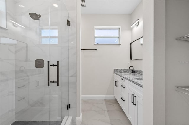 8319 N Ogontz Ave, Tampa, FL 33604 - bathroom featuring marble finish flooring, double vanity, and a stall shower