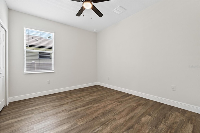 8319 N Ogontz Ave, Tampa, FL 33604 - spare room with dark wood finished floors and ceiling fan