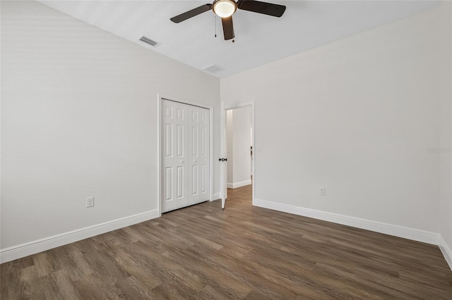 8319 N Ogontz Ave, Tampa, FL 33604 - unfurnished bedroom with wood finished floors, a closet, and a ceiling fan