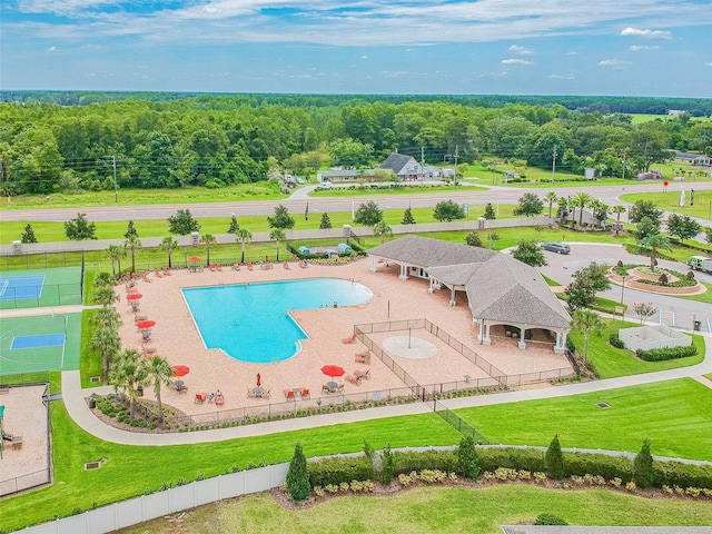 12351 Nouveau Ave, Spring Hill, FL 34610 - drone / aerial view of a pool and a forest