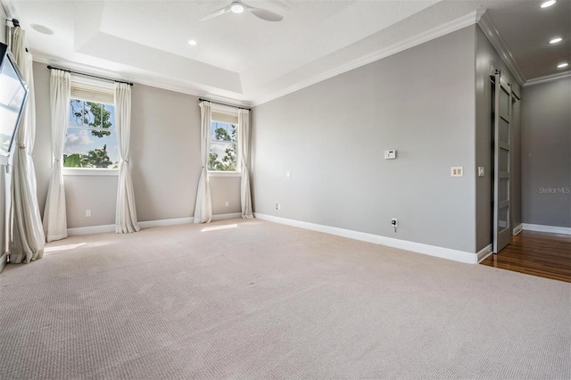 650 Geneva Pl, Tampa, FL 33606 - empty room featuring crown molding, carpet flooring, a ceiling fan, a tray ceiling, and recessed lighting