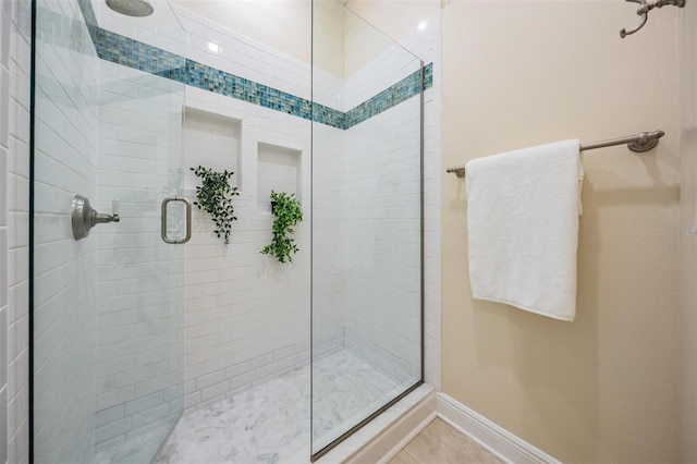 650 Geneva Pl, Tampa, FL 33606 - full bathroom with a shower stall and tile patterned floors