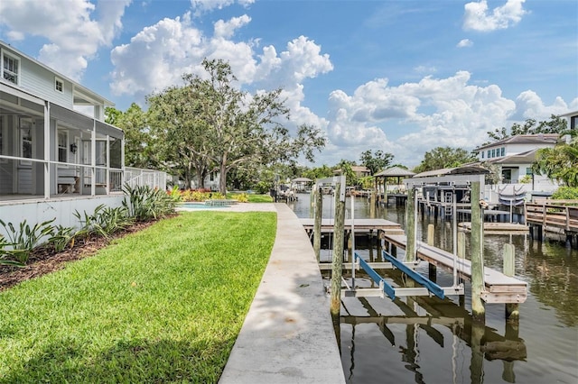 650 Geneva Pl, Tampa, FL 33606 - dock with boat lift, a yard, and a water view