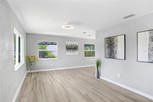 201 83rd Ave N, Saint Petersburg, FL 33702 - unfurnished room featuring light wood-style flooring and baseboards