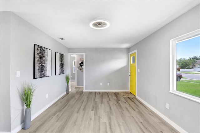 201 83rd Ave N, Saint Petersburg, FL 33702 - empty room with light wood-style flooring and baseboards