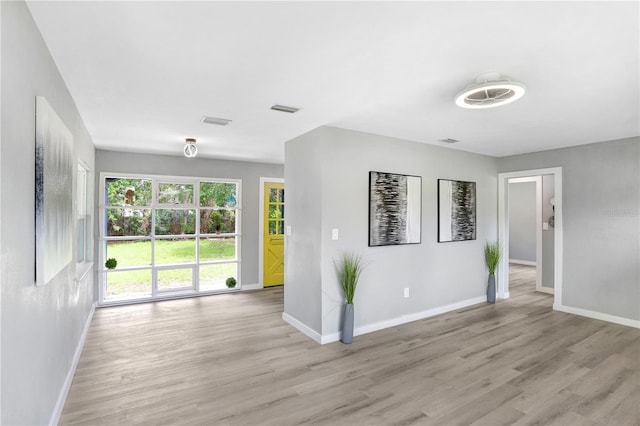 201 83rd Ave N, Saint Petersburg, FL 33702 - empty room with light wood-style flooring