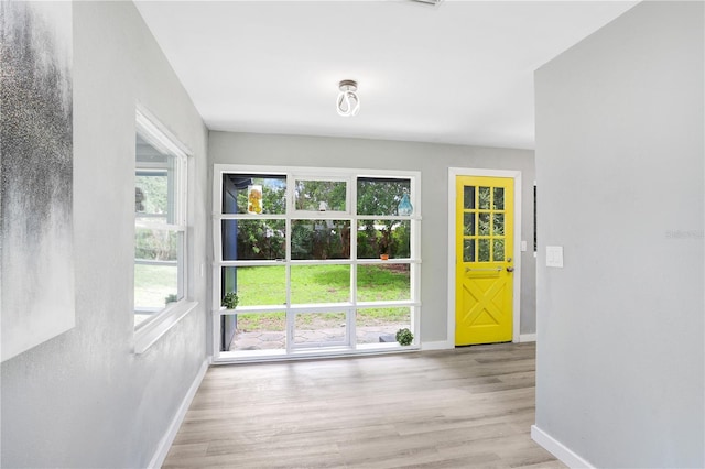 201 83rd Ave N, Saint Petersburg, FL 33702 - interior space with baseboards and wood finished floors