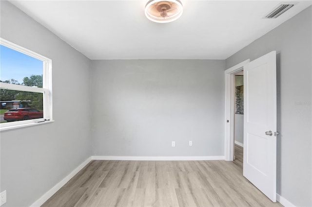 201 83rd Ave N, Saint Petersburg, FL 33702 - unfurnished room featuring light wood-style floors and baseboards