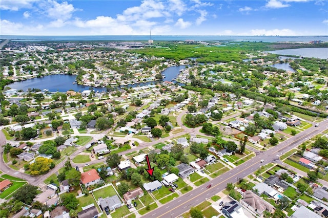 201 83rd Ave N, Saint Petersburg, FL 33702 - aerial overview of property's location with a large body of water and nearby suburban area