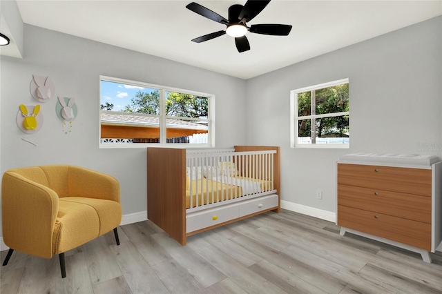 1223 Jasmine Way, Clearwater, FL 33756 - bedroom with wood finished floors and ceiling fan