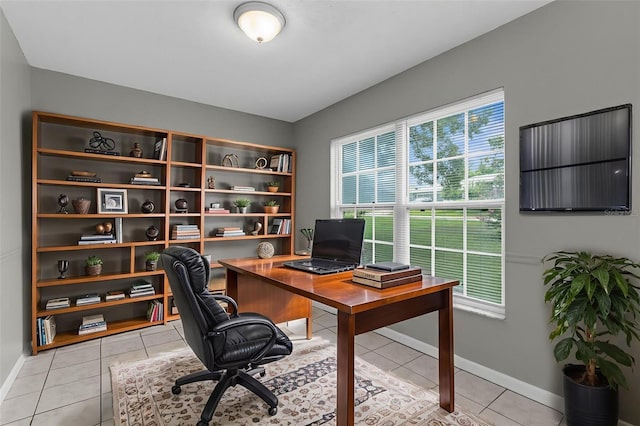 5112 Odin St, Spring Hill, FL 34608 - office area with light tile patterned flooring and baseboards