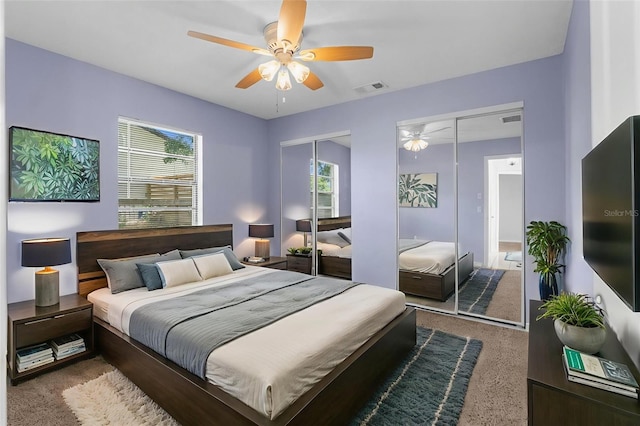 5112 Odin St, Spring Hill, FL 34608 - bedroom with carpet, two closets, and a ceiling fan