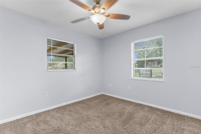 5112 Odin St, Spring Hill, FL 34608 - carpeted spare room with baseboards and ceiling fan