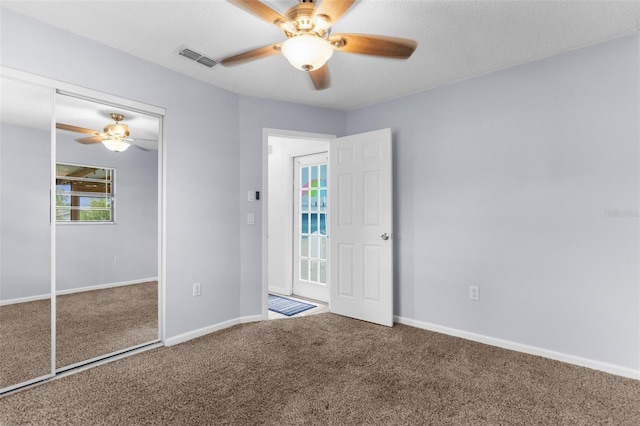 5112 Odin St, Spring Hill, FL 34608 - unfurnished bedroom with carpet, a closet, and ceiling fan