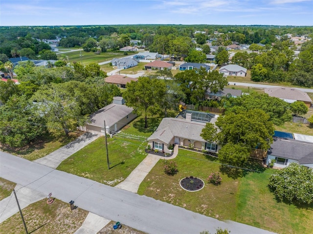 5112 Odin St, Spring Hill, FL 34608 - aerial perspective of suburban area with a tree filled landscape