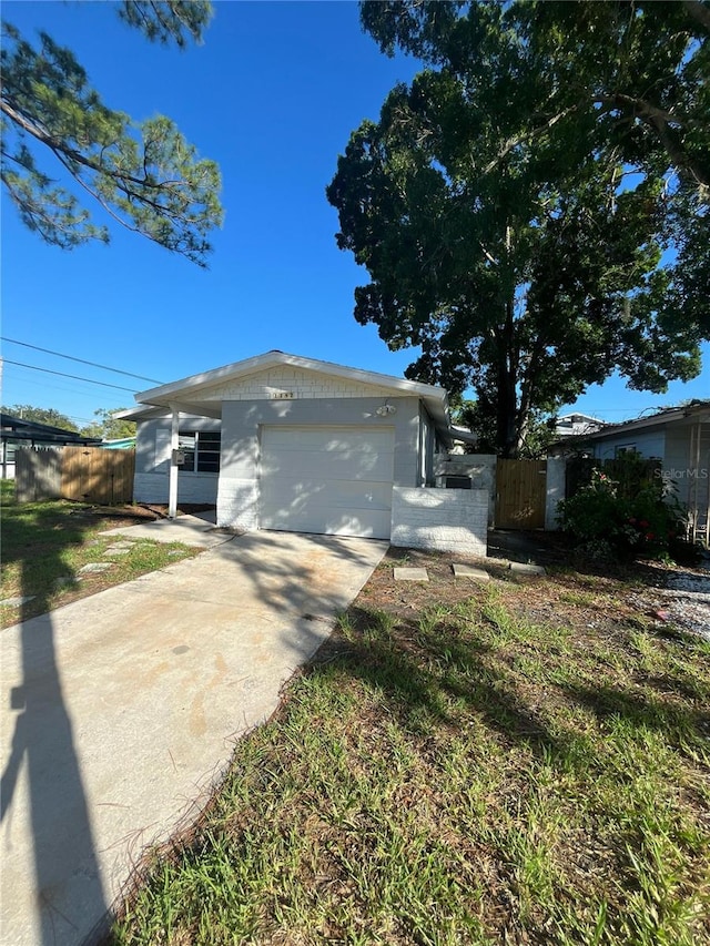 1782 Michigan Ave NE, Saint Petersburg, FL 33703 - view of home's exterior featuring driveway