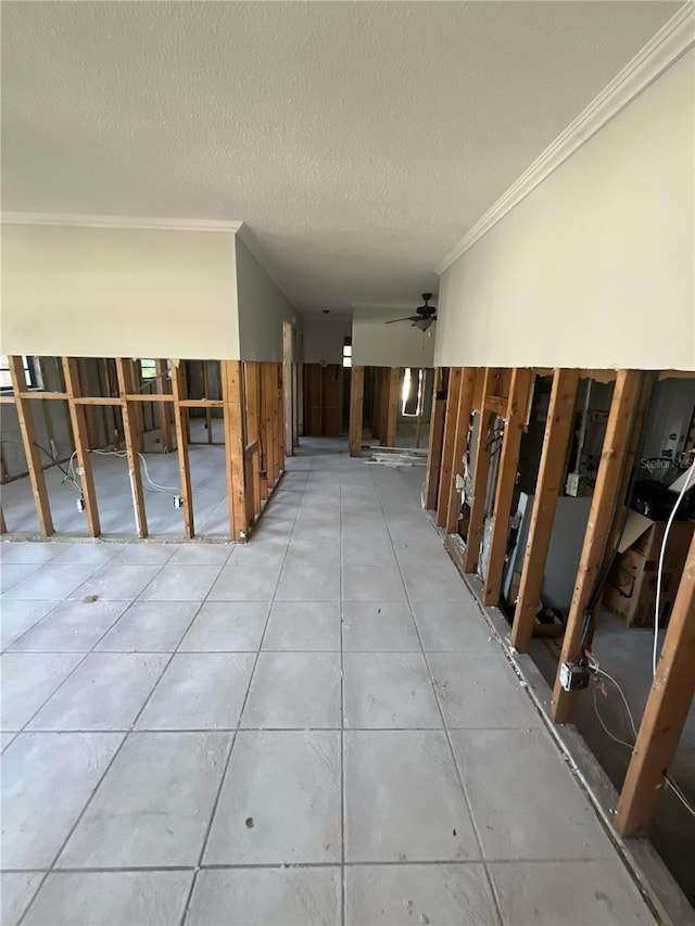 1782 Michigan Ave NE, Saint Petersburg, FL 33703 - miscellaneous room with ornamental molding, ceiling fan, and a textured ceiling