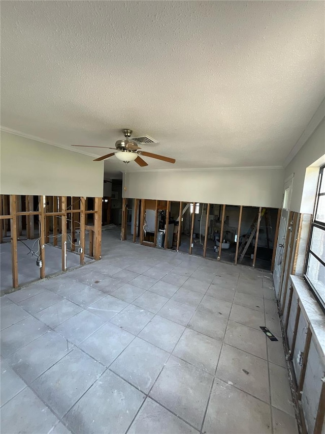 1782 Michigan Ave NE, Saint Petersburg, FL 33703 - unfurnished room featuring a textured ceiling, a ceiling fan, and crown molding