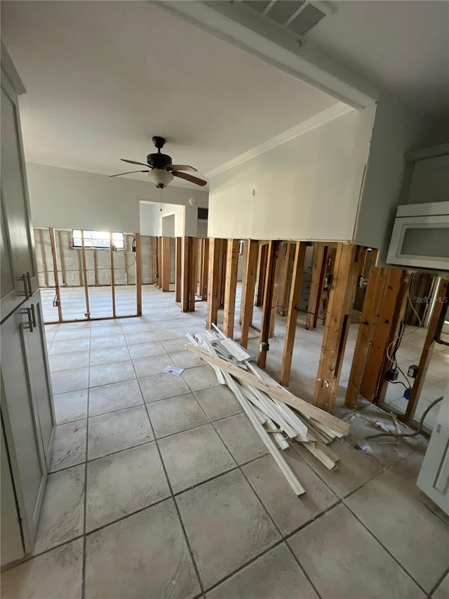 1782 Michigan Ave NE, Saint Petersburg, FL 33703 - empty room featuring crown molding and a ceiling fan