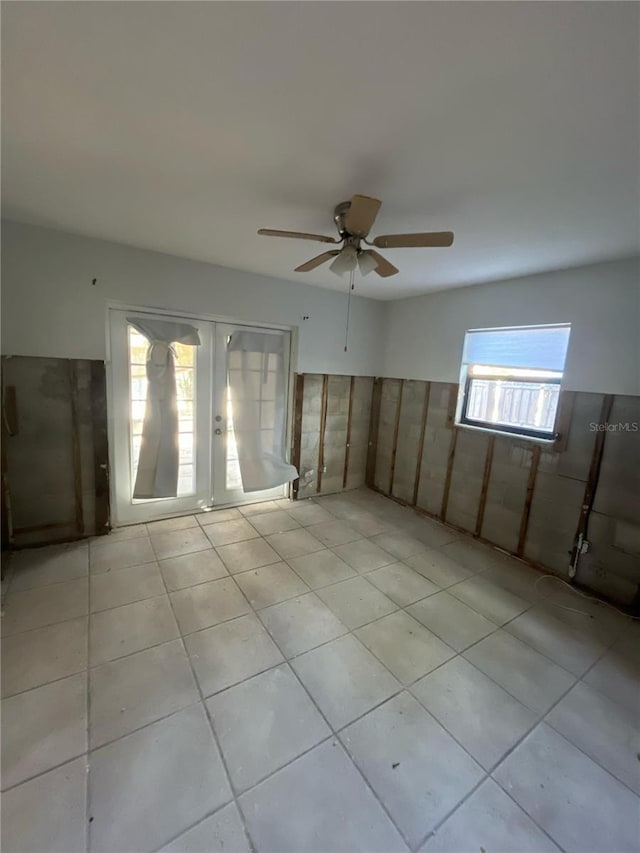 1782 Michigan Ave NE, Saint Petersburg, FL 33703 - unfurnished room featuring a ceiling fan and light tile patterned flooring