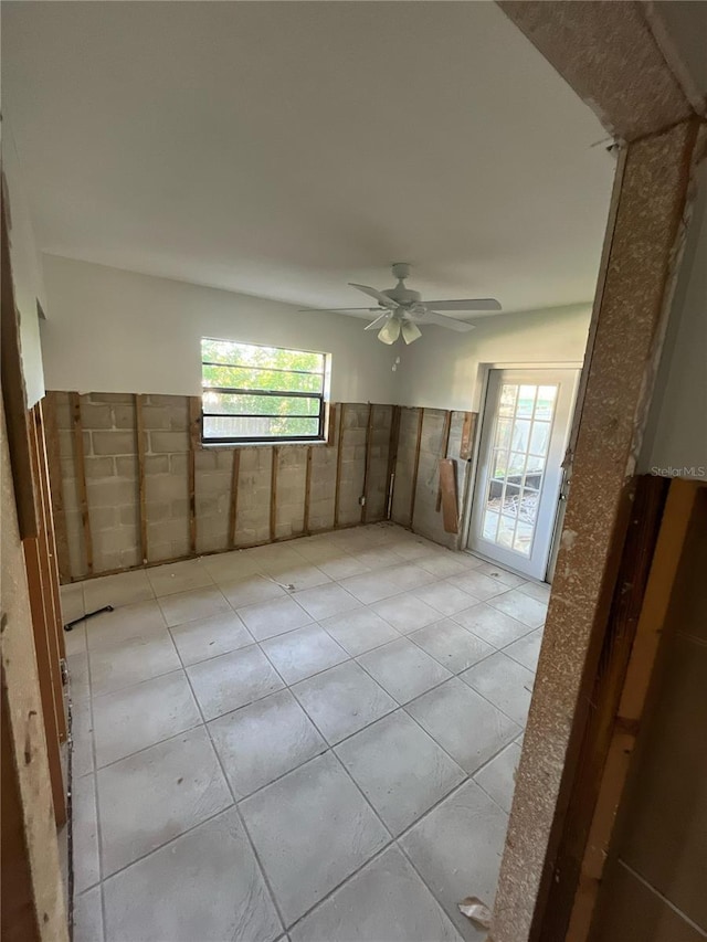 1782 Michigan Ave NE, Saint Petersburg, FL 33703 - spare room with light tile patterned floors and ceiling fan